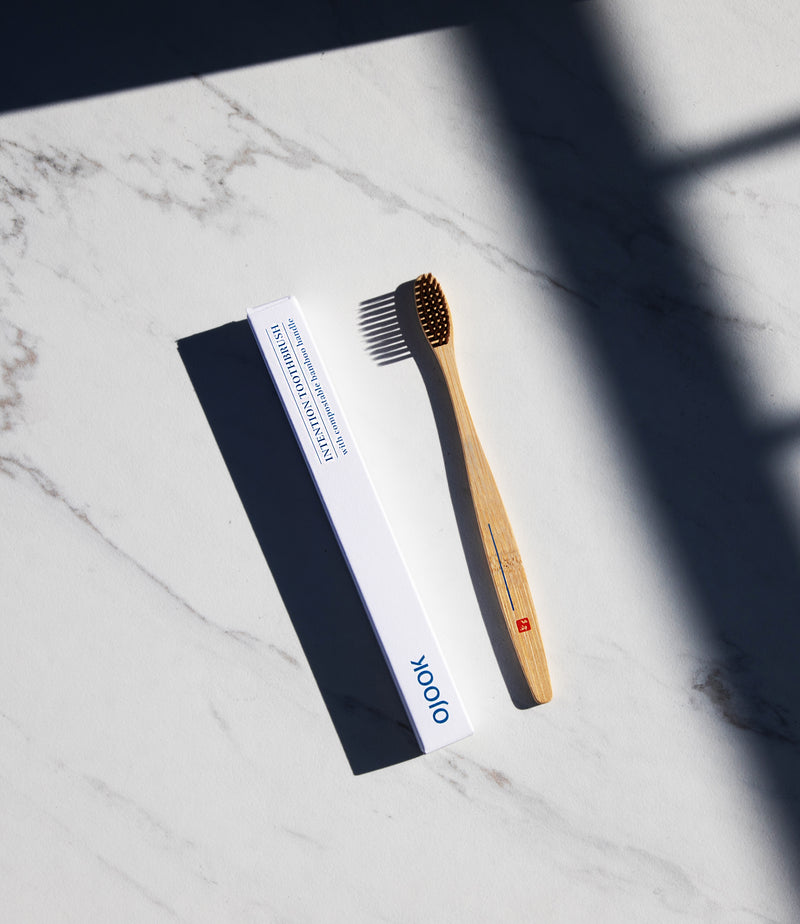 OJOOK bamboo toothbrush is intention setting tool to build healthy daily habits. Made with soft bristle from Asia with a space on the bamboo handle for mindfulness exercises